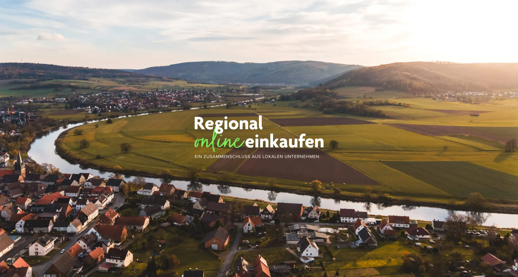 Startseite von edomo: Regional online einkaufen, über einer Flusslandschaft